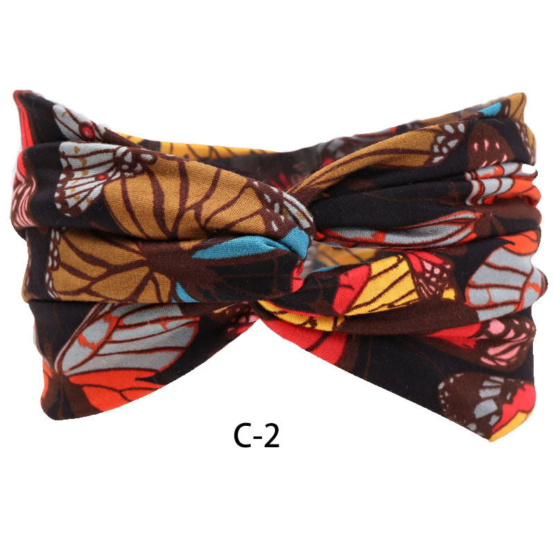 Tela al por mayor Boho Style New Elastic Cross Sport Diadema